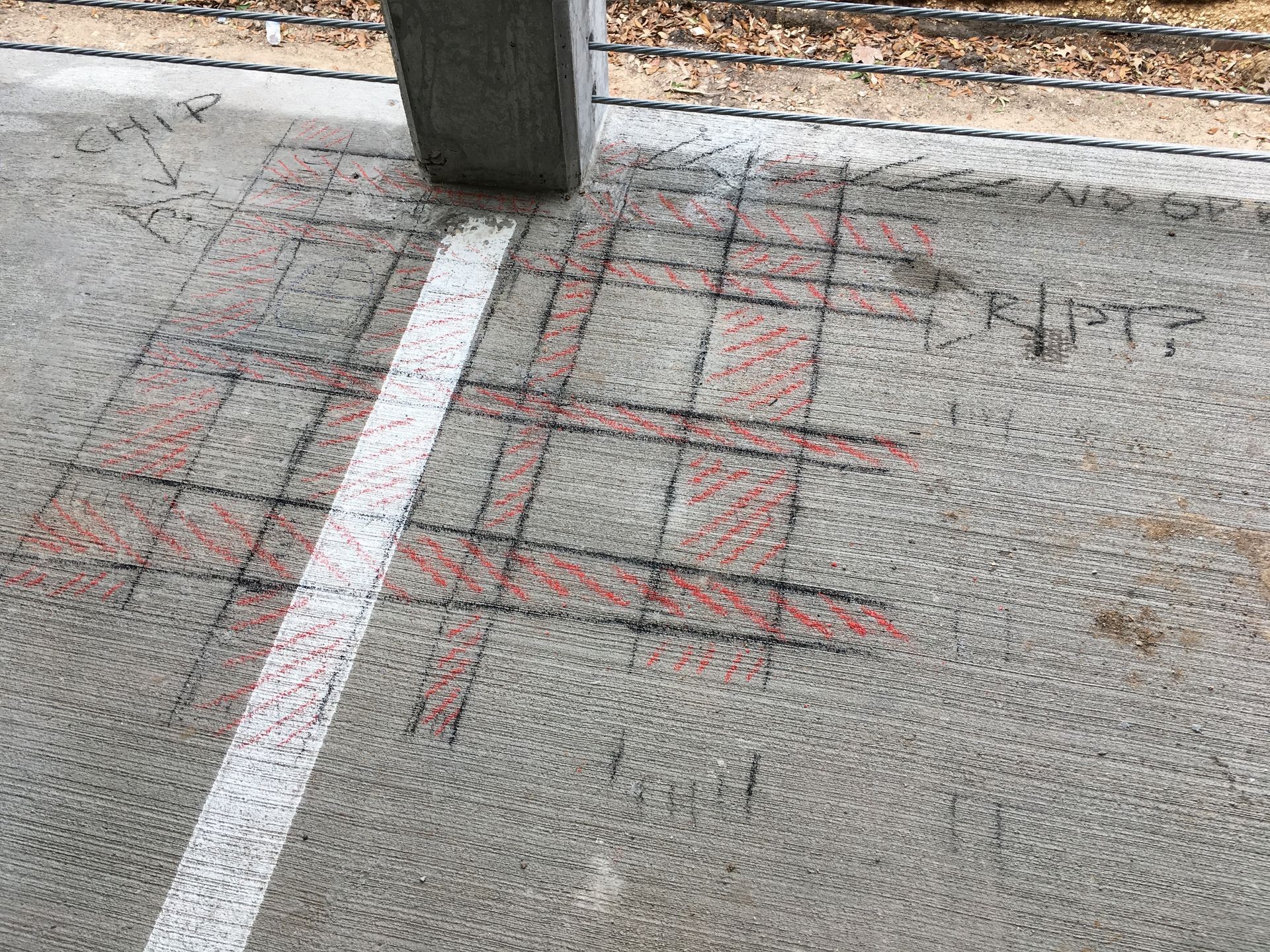 Potholing crew exposing underground line with visible paint markings for verified mapping.